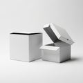 Two White Cardboard Boxes, One Closed and One Open, on a Light Gray Surface container Royalty Free Stock Photo