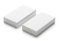 Two identical white rectangular blocks placed on a plain white surface with subtle shadows and clean lines Royalty Free Stock Photo