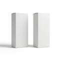 Two identical white rectangular boxes standing side by side on a plain surface Royalty Free Stock Photo