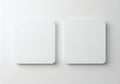 Two identical white rectangular objects placed side by side on a plain background Royalty Free Stock Photo
