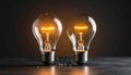 Two Incandescent Light Bulbs, One Intact and Glowing, One Broken with Filament Visible image Royalty Free Stock Photo
