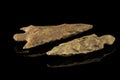 Two Indian arrowheads and black background Royalty Free Stock Photo