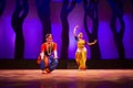 Two Indian Classical odissi dancer performing at stage Royalty Free Stock Photo