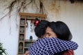 Indian female friends hugging and comforting each other