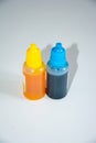 Orange yellow and deep blue ink droppers juxtaposed, with vivid colors and the beauty of still life Royalty Free Stock Photo