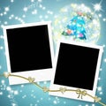 Two instant photo frames and christmas tree within a ball Royalty Free Stock Photo