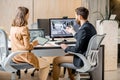 Two interior designers working in the office Royalty Free Stock Photo