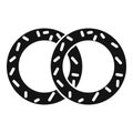 Two interlocked black rubber gaskets with white dots pattern are lying Royalty Free Stock Photo