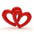Two interlocking hearts with a glossy red finish on a plain background Royalty Free Stock Photo