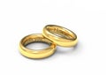 Two intertwined gold wedding rings. Royalty Free Stock Photo