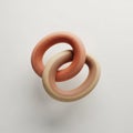 Two intertwined, torus-shaped objects in soft Royalty Free Stock Photo
