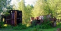 Two iron rusty boats - the rest of the industry of the Soviet Union in the wild forests of the tundra of Yakutia.