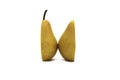 Two halves of a pear stand on a white isolated background.