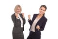 Two isolated successful woman working in a team. Isolated portrait with two businesswoman.