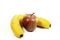 Two Isolated Yellow Ripe Bananas and Apple on white Royalty Free Stock Photo