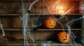 Two Jack o Lanterns Carved from Oranges on Shelf Royalty Free Stock Photo