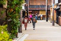 Two japanese women in a kimono on a city street in Kyoto, Japan. Royalty Free Stock Photo