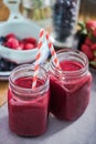 Two jars with berry smoothie Royalty Free Stock Photo
