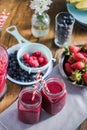 Two jars with berry smoothie Royalty Free Stock Photo