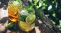 two jars with lemon, lime and mint iced tea Royalty Free Stock Photo