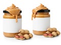Two jars of peanut butter with peanuts isolated on white background Royalty Free Stock Photo