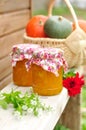 Two Jars of Pumpkin Jam on a Bench Royalty Free Stock Photo