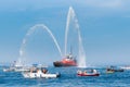 Fire brigade ship with high splashes to the sky Royalty Free Stock Photo