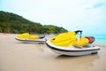 Two jetskis on sandy beach Royalty Free Stock Photo