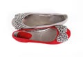 Two jeweled flat shoes