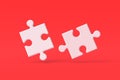 Two jigsaw puzzle pieces on red background Royalty Free Stock Photo