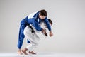 The two judokas fighters fighting men Royalty Free Stock Photo