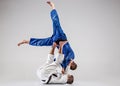 The two judokas fighters fighting men Royalty Free Stock Photo