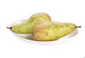Two juicy pears on a plate isolated on a white background Royalty Free Stock Photo