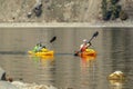 Two Kayakers in lake.