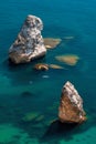 Two Kayaks on the background of coastal cliffs, calm clear blue sea, rock Orest and Pilad, cape Fiolent in Balaklava Sevastopol Royalty Free Stock Photo