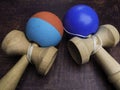 Two Kendama japanese toys, competition sport concept, used and new toy