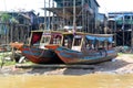 Two Khmer Boats Stand Ashore