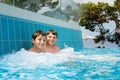 Two kids boys having fun in outdoor pool. Summer holiday. Summertime kids weekend. Children having fun, brothers on Royalty Free Stock Photo