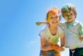 Two kids with face smeared with colors Royalty Free Stock Photo