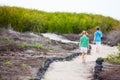 Two kids hiking at park Royalty Free Stock Photo