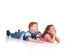 Two kids lying on floor Royalty Free Stock Photo