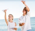 Two kids playing paper planes Royalty Free Stock Photo