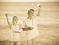 Two kids playing paper planes Royalty Free Stock Photo