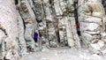 Two Kids Playing in a Rocky Crag