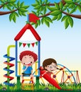 Two kids playing slide in park Royalty Free Stock Photo