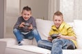 Two kids playing video games Royalty Free Stock Photo