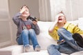 Two kids playing video games Royalty Free Stock Photo