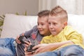 Two kids playing video games Royalty Free Stock Photo