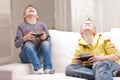 Two kids playing video games Royalty Free Stock Photo