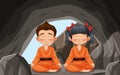 Two kids practicing meditation in cave Royalty Free Stock Photo